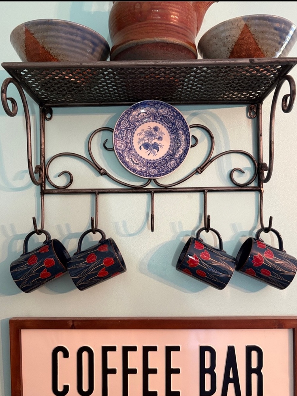 Black Wrought Iron Wall Shelf with Hooks and Decorative Blue Plate - Picture 12 of 12